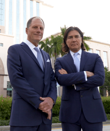 Bill Bone and Christopher Larmoyeux Outside the West Palm Beach Courthouse