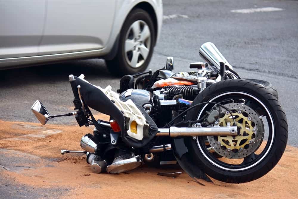 Motorcycle Laying Down After An Accident Crash with a car